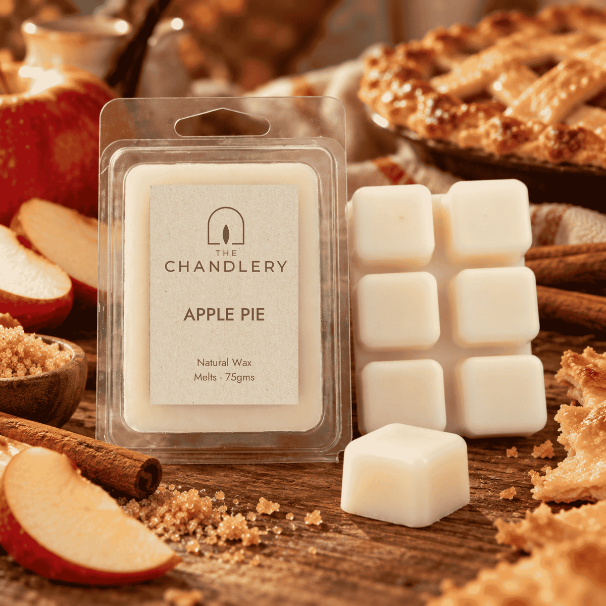 Apple Pie wax melt packet, six-cube ivory snap bar and loose cube with apples, cinnamon and baked pastry.