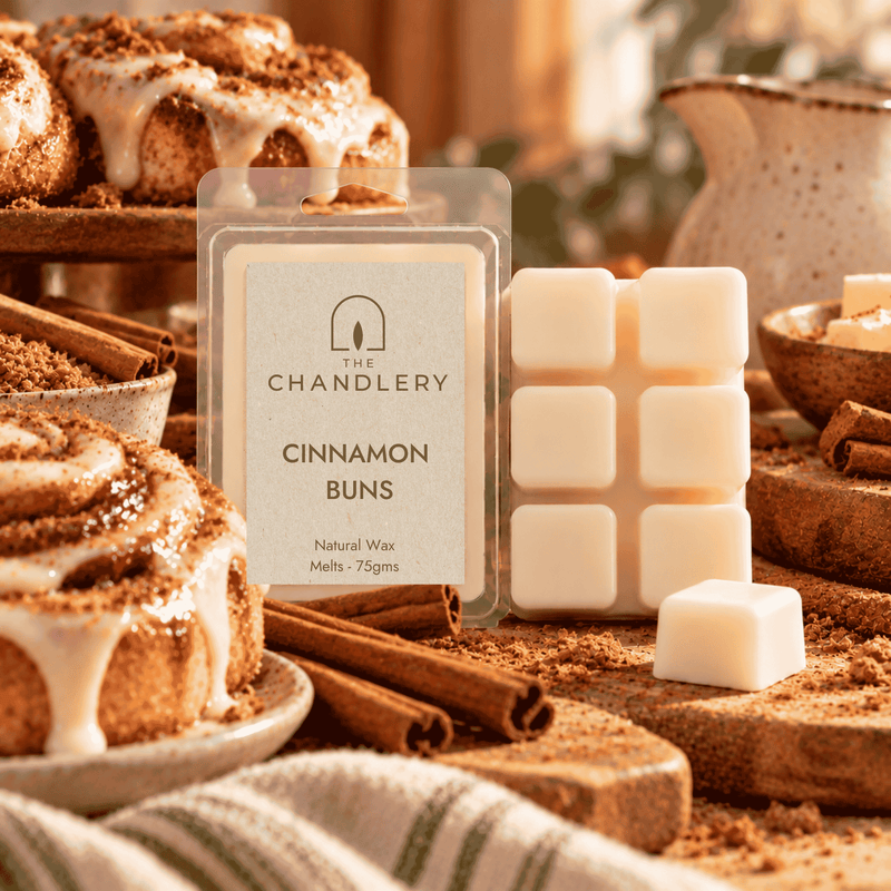 Cinnamon Buns wax melt packet, six-cube ivory snap bar and loose cube with iced cinnamon buns and cinnamon sticks.