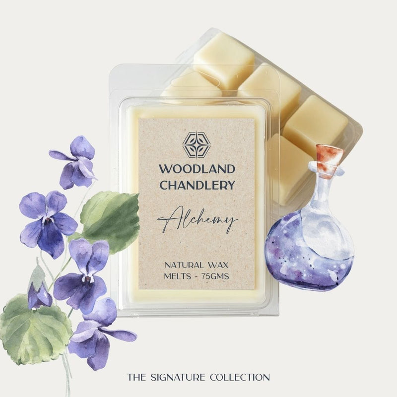 Alchemy soy wax melts in a clear clamshell, illustrated with violets and a potion bottle